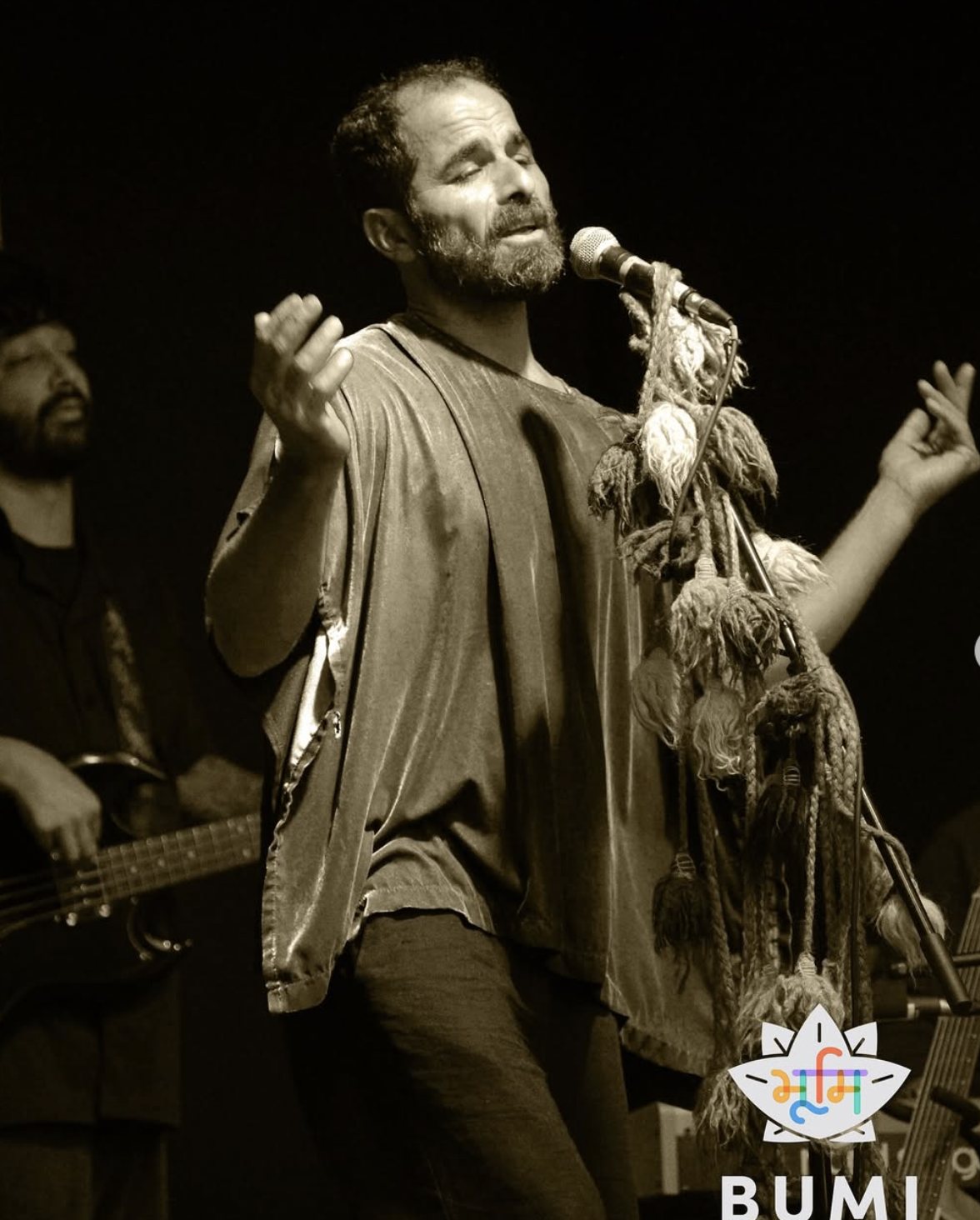 Close-up of Kamakan's singer performing live